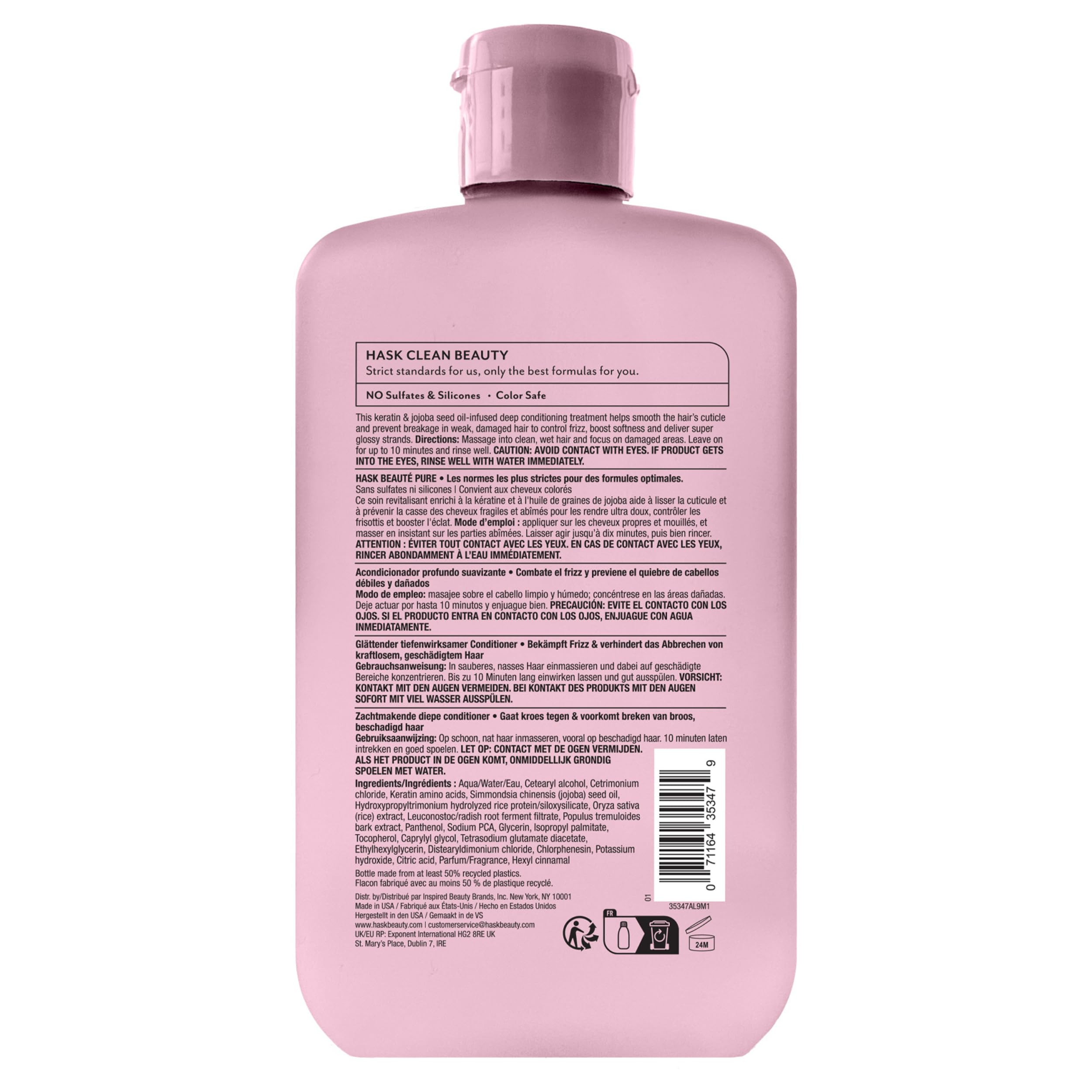 HASK bottle in hand for scale, showing 8 fl oz travel-friendly size