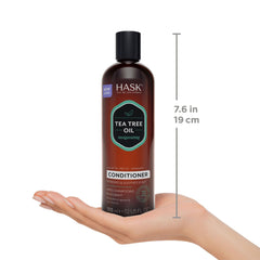 HASK 12 fl oz bottle next to common items showing actual size