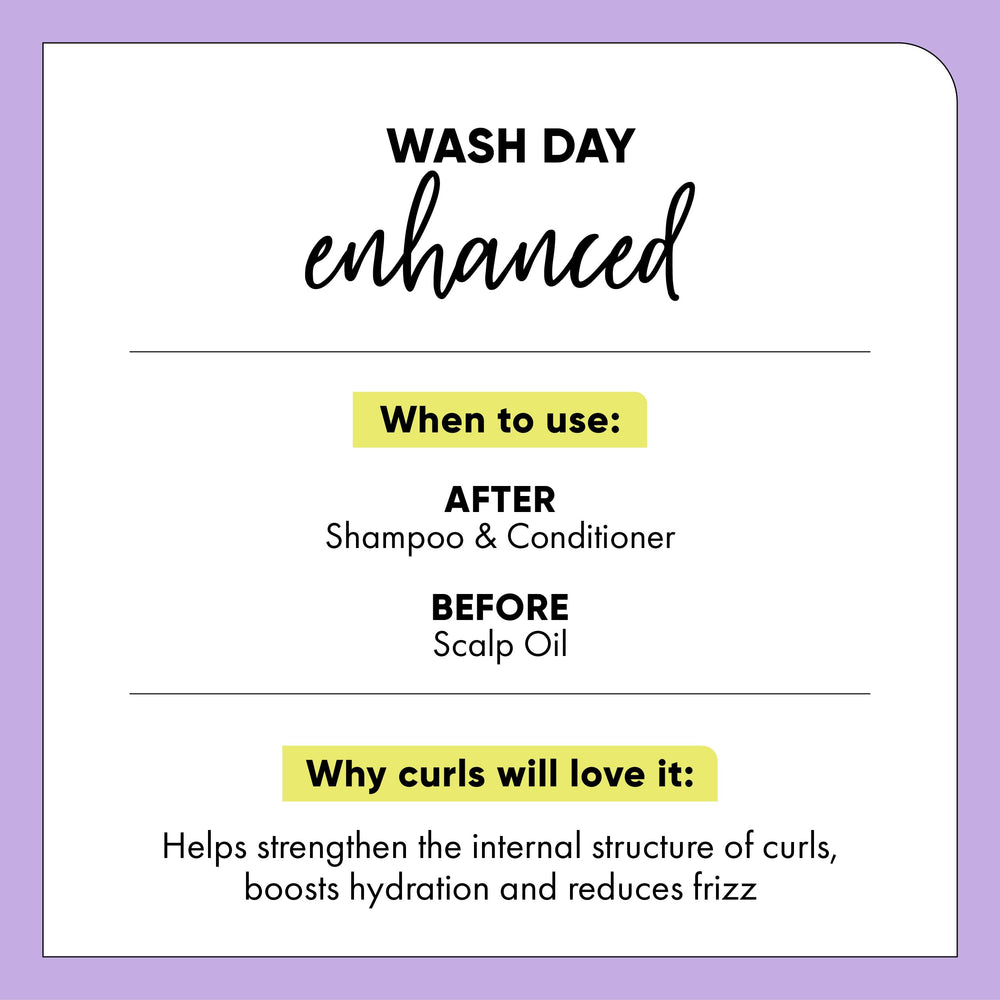 HASK applied to curls in hand showing easy detangling benefit