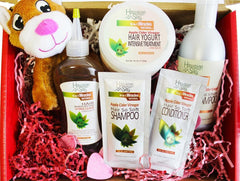 Hawaiian Silky applied to wet hair in hand for detangling