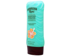 Hawaiian Tropic applied to shoulder at beach showing cooling comfort benefit