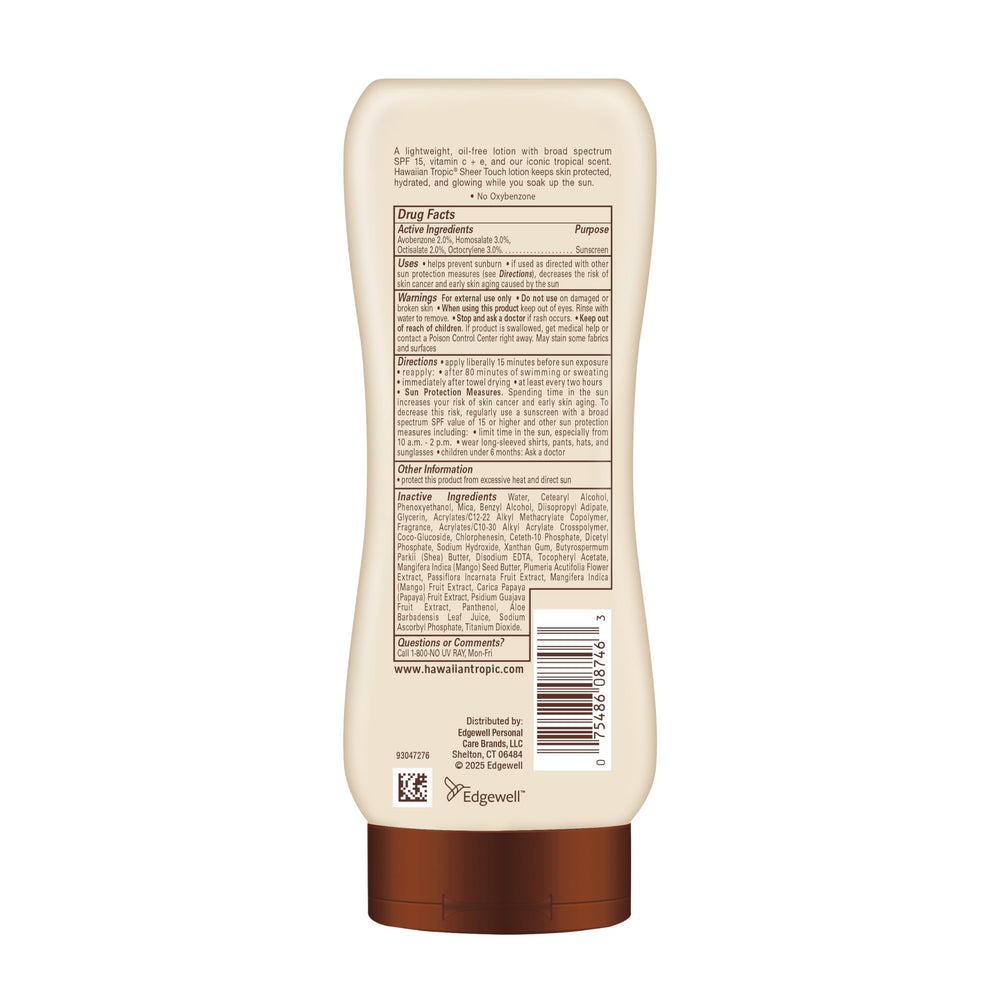 Hawaiian Tropic bottle on beach towel showing water-resistant outdoor use benefit