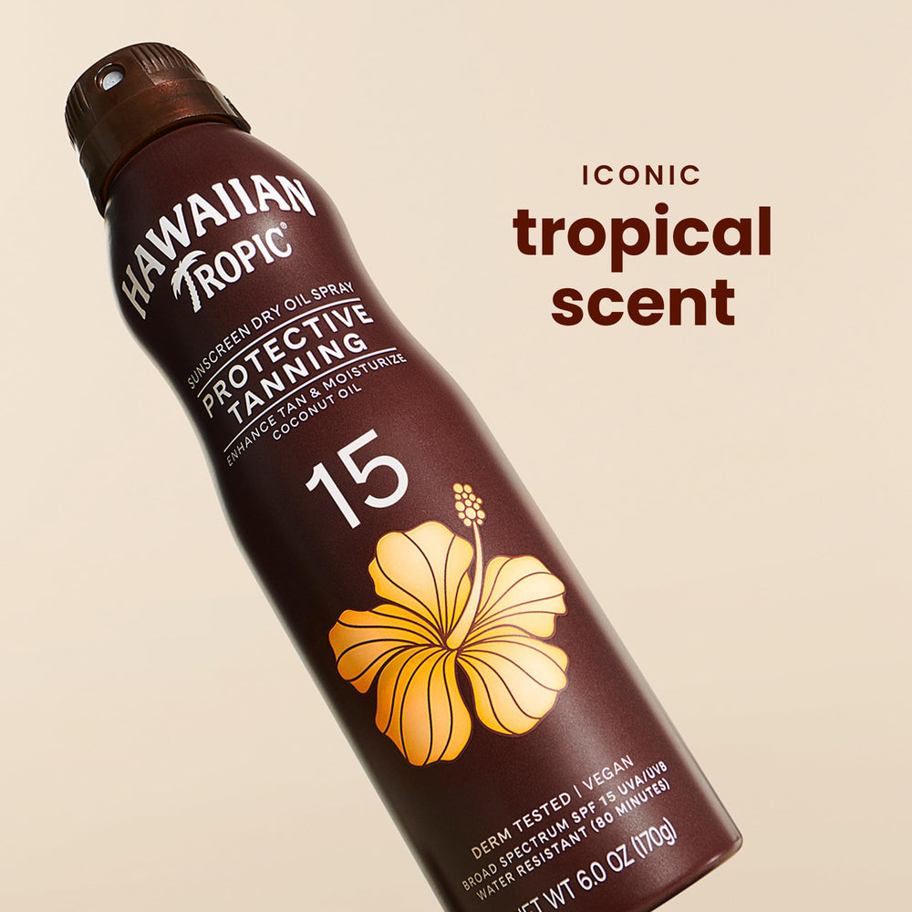 Hawaiian Tropic clear dry oil texture close-up showing lightweight, fast-absorbing finish