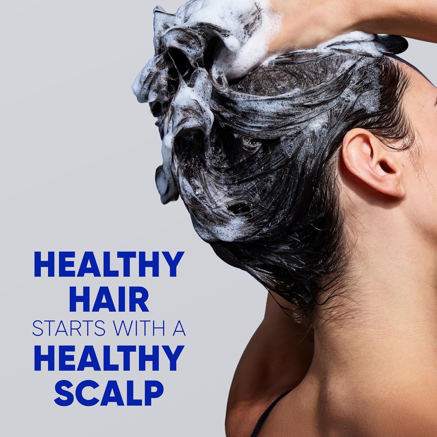 Dispensing shampoo from bottle pump into hand showing easy application for daily use