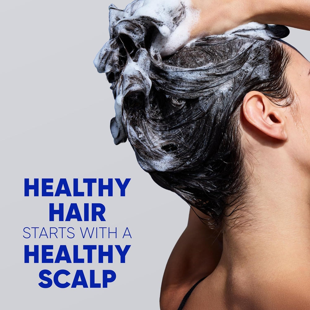 Dispensing shampoo from bottle pump into hand showing easy application for daily use