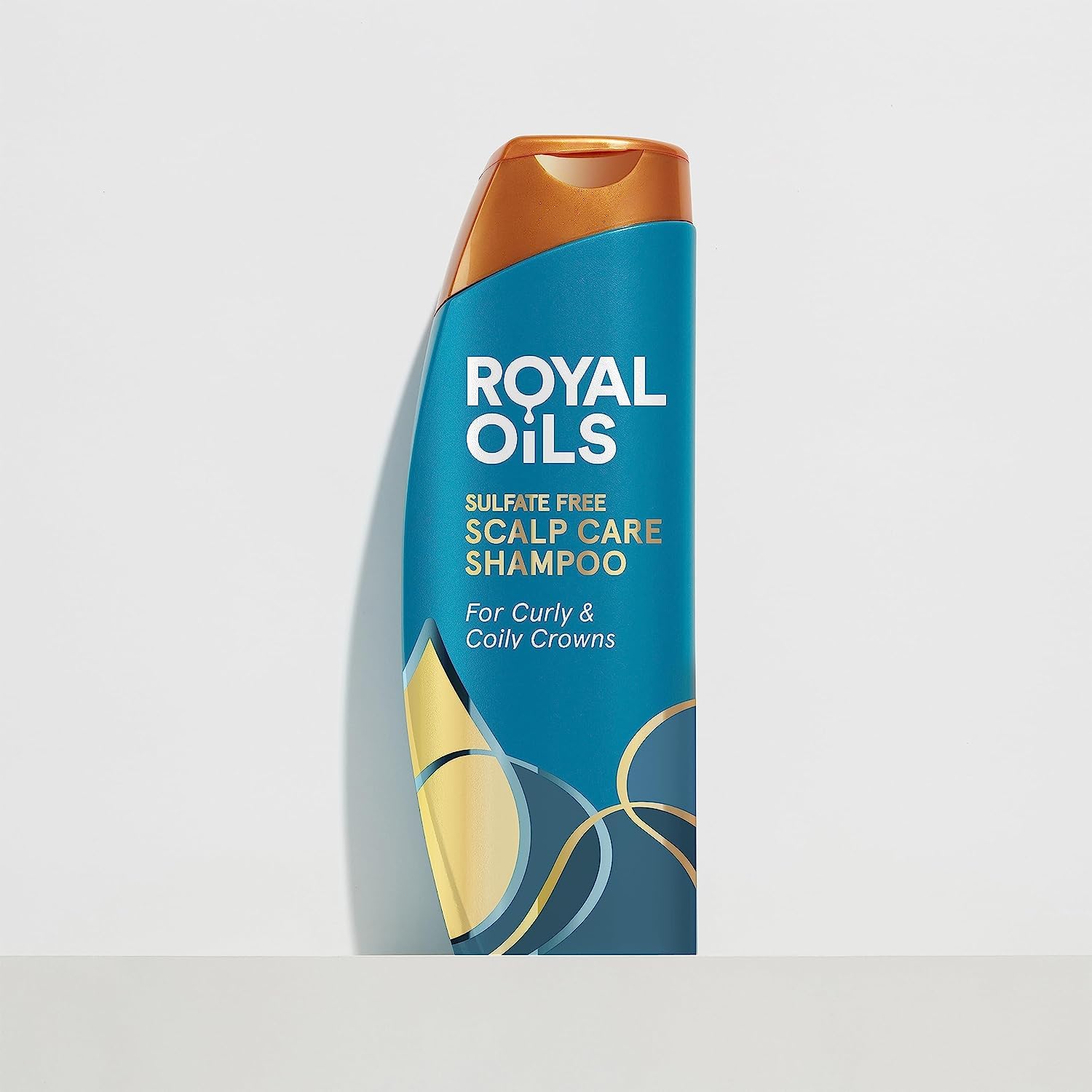 Head & Shoulders shampoo next to everyday items showing 12.8 fl oz scale and value