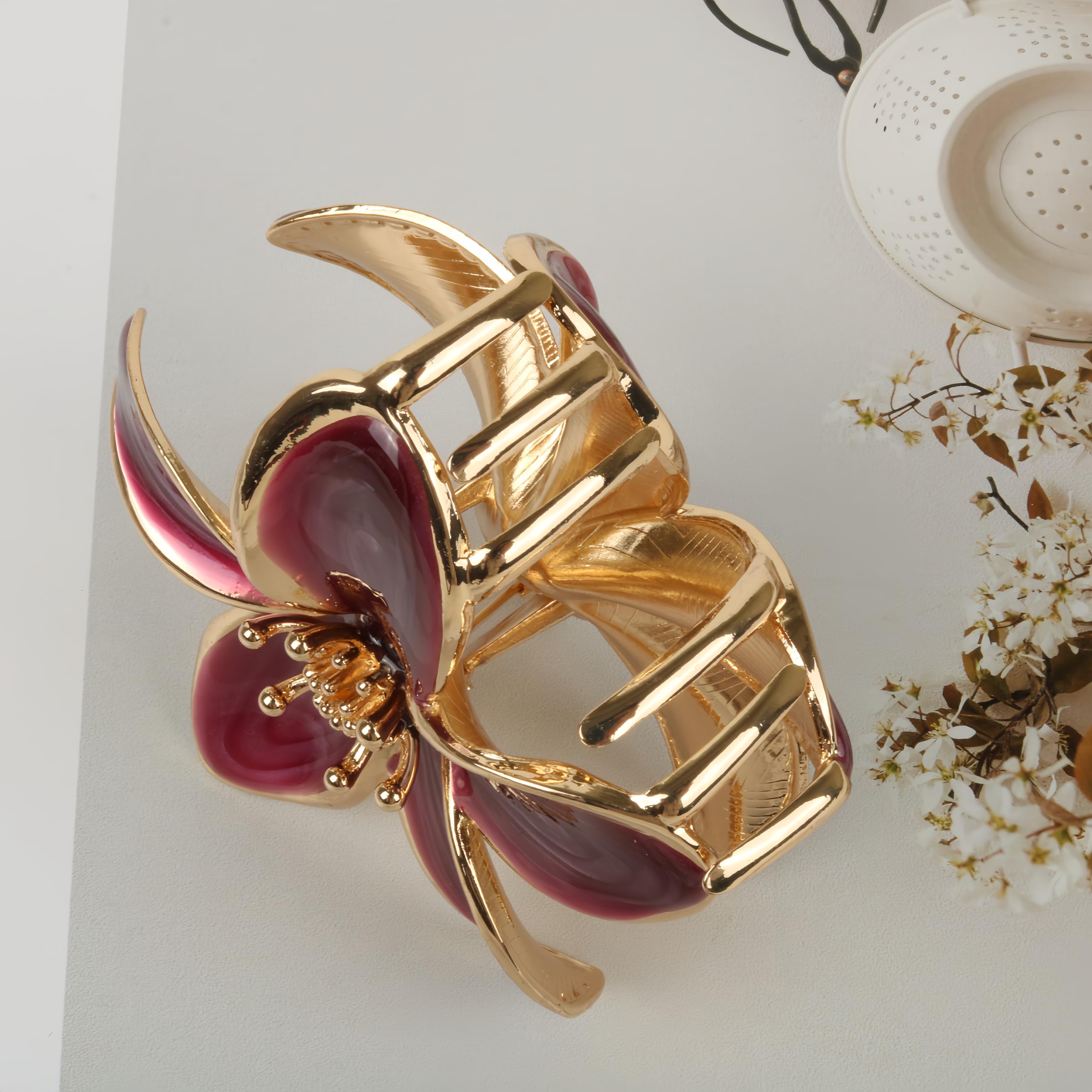 Heilor two-plumeria clips displayed as a matching gift set