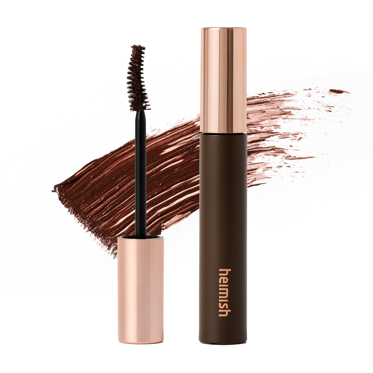 HEIMISH bottle front showing berry brown shade and compact packaging benefit