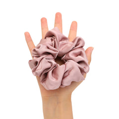 Helamvly scrunchie in lifestyle bedroom scene showing comfortable sleep-friendly wear