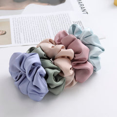 Helamvly green blue scrunchie close-up showing silky texture and gentle hold