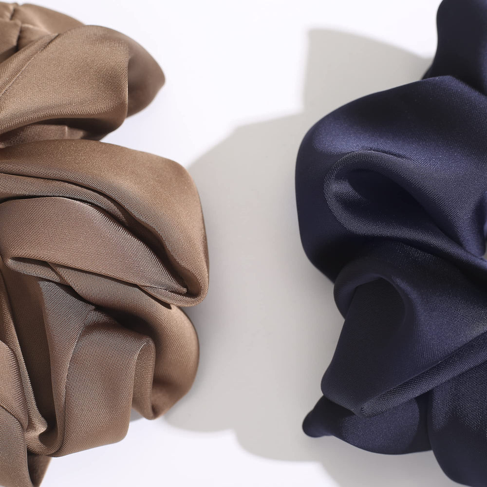 Helamvly scrunchie in a low bun illustrating polished look benefit suitable for events