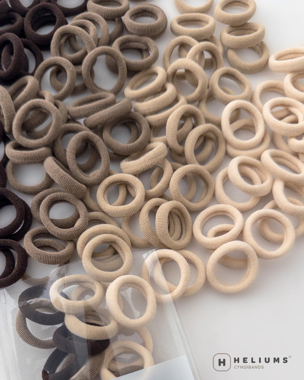 Heliums color swatches comparing light brown blend for subtle concealment