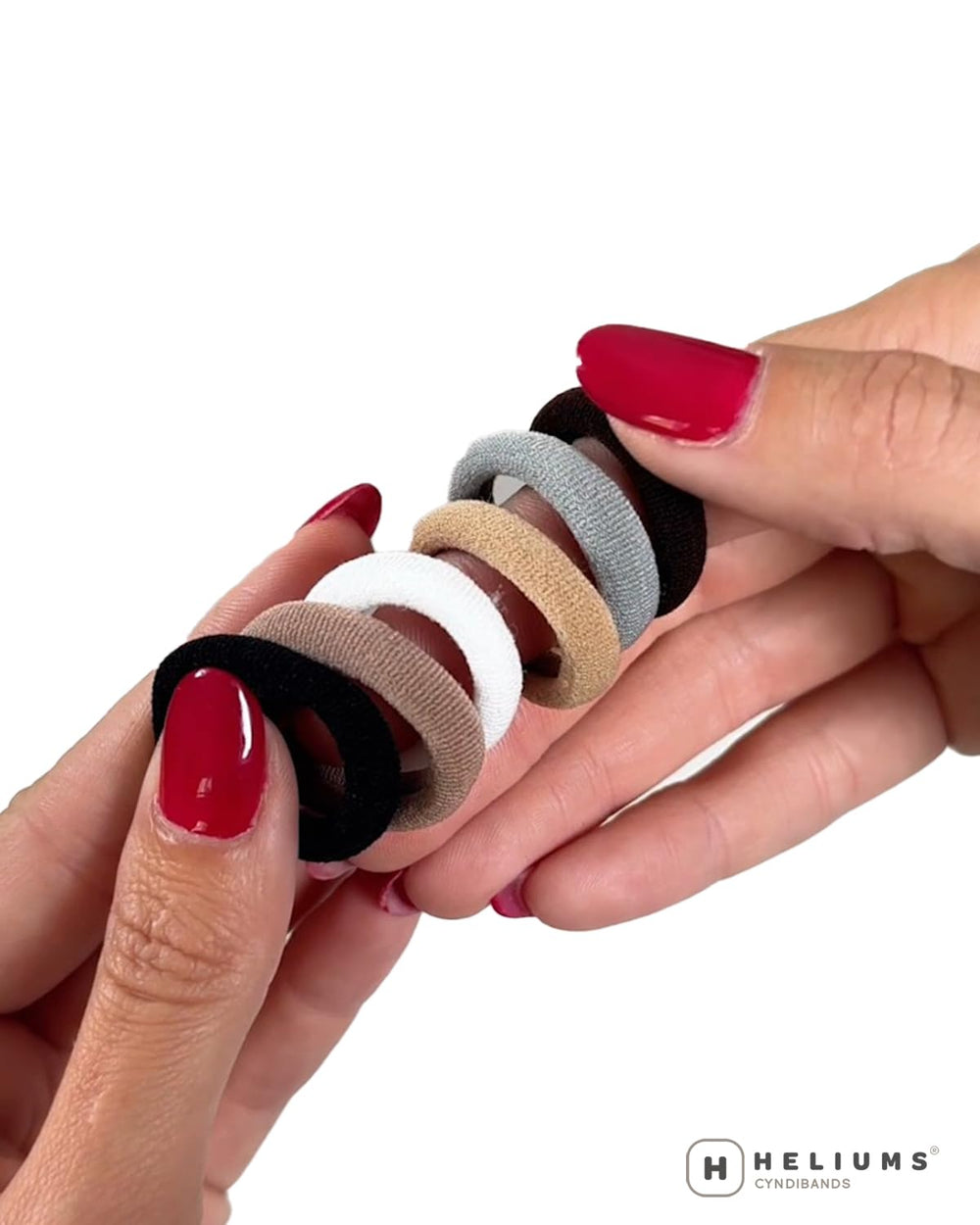 Heliums light brown band next to hair swatches for accurate color matching