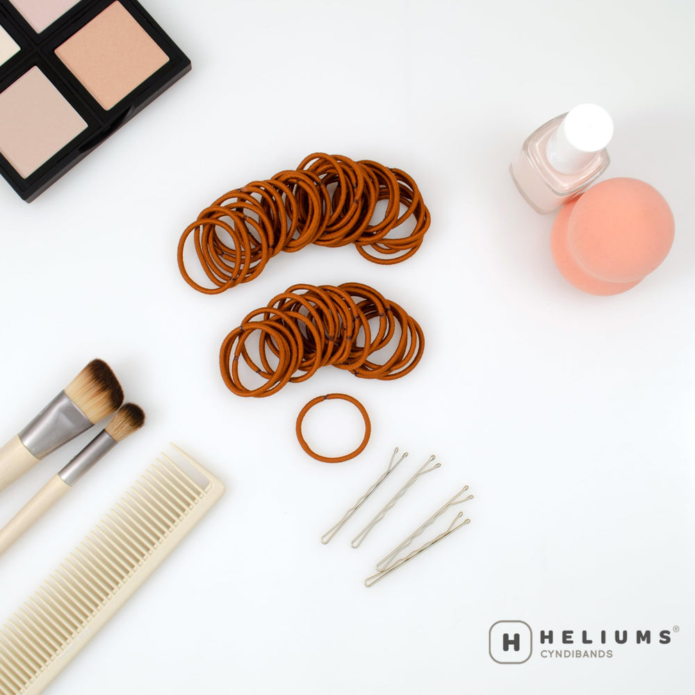 Heliums fabric close-up on copper elastic showing gentle finish