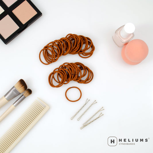 Heliums fabric close-up on copper elastic showing gentle finish