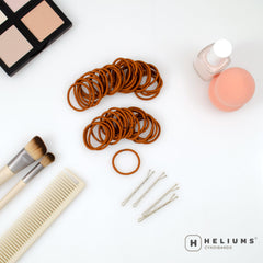Heliums fabric close-up on copper elastic showing gentle finish