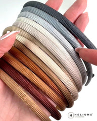 Heliums four shades laid flat displaying color range and outfit matching