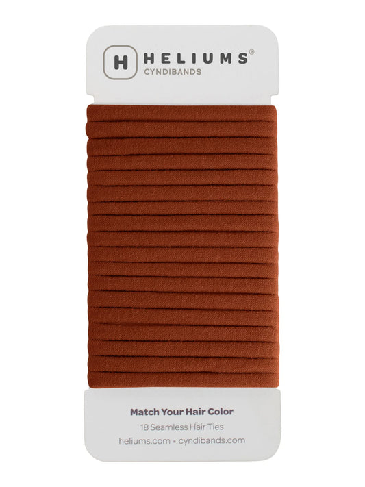 Heliums front packaging showing dark ginger 18-pack and product benefit neat storage