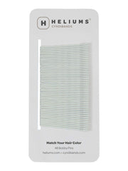 Heliums front-packaging showing 48 white bobby pins blending with hair