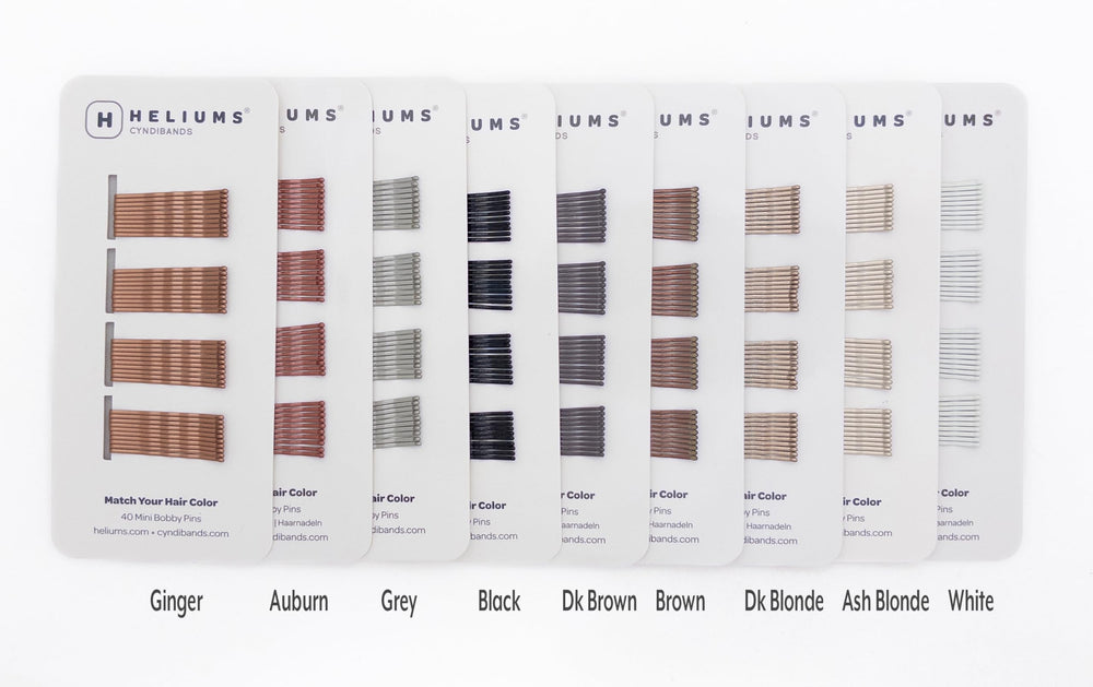 Heliums pins blended into blonde hair for discreet styling benefit