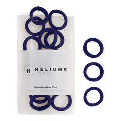 Heliums front packaging showing 30 navy blue mini hair ties and neat storage benefit