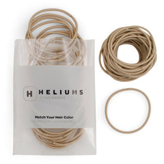 Heliums front pack showing 40 sandy blonde elastics, convenient storage