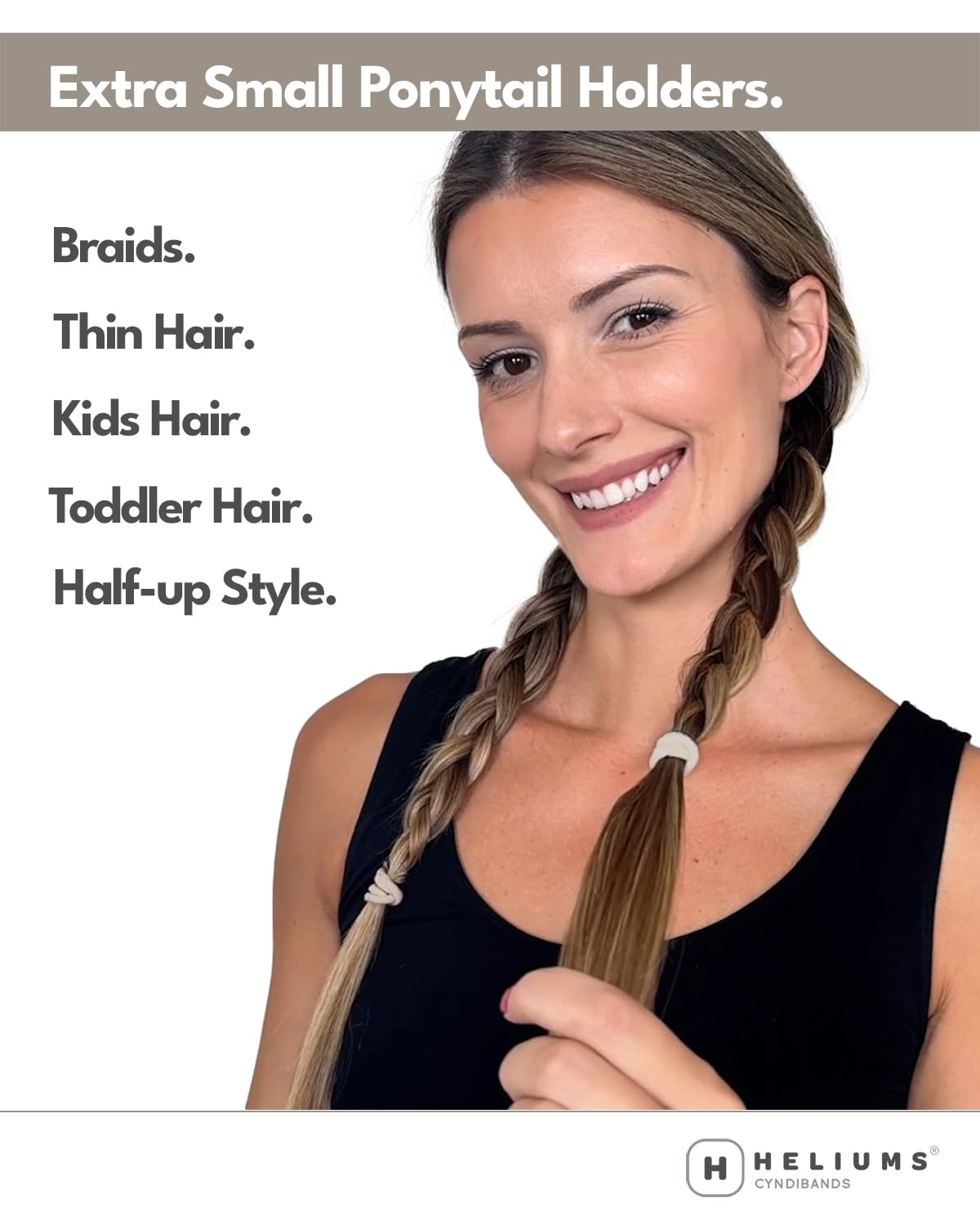 Heliums mini hair tie beside coin showing small size and precise fit