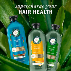 Herbal Essences in-shower use showing lather and easy rinsing benefit