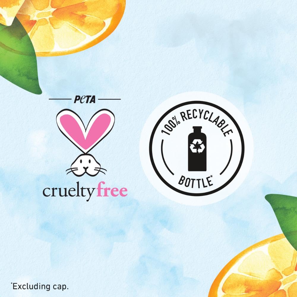 Shower scene with Herbal Essences bottle and fresh citrus accents portraying uplifting scent