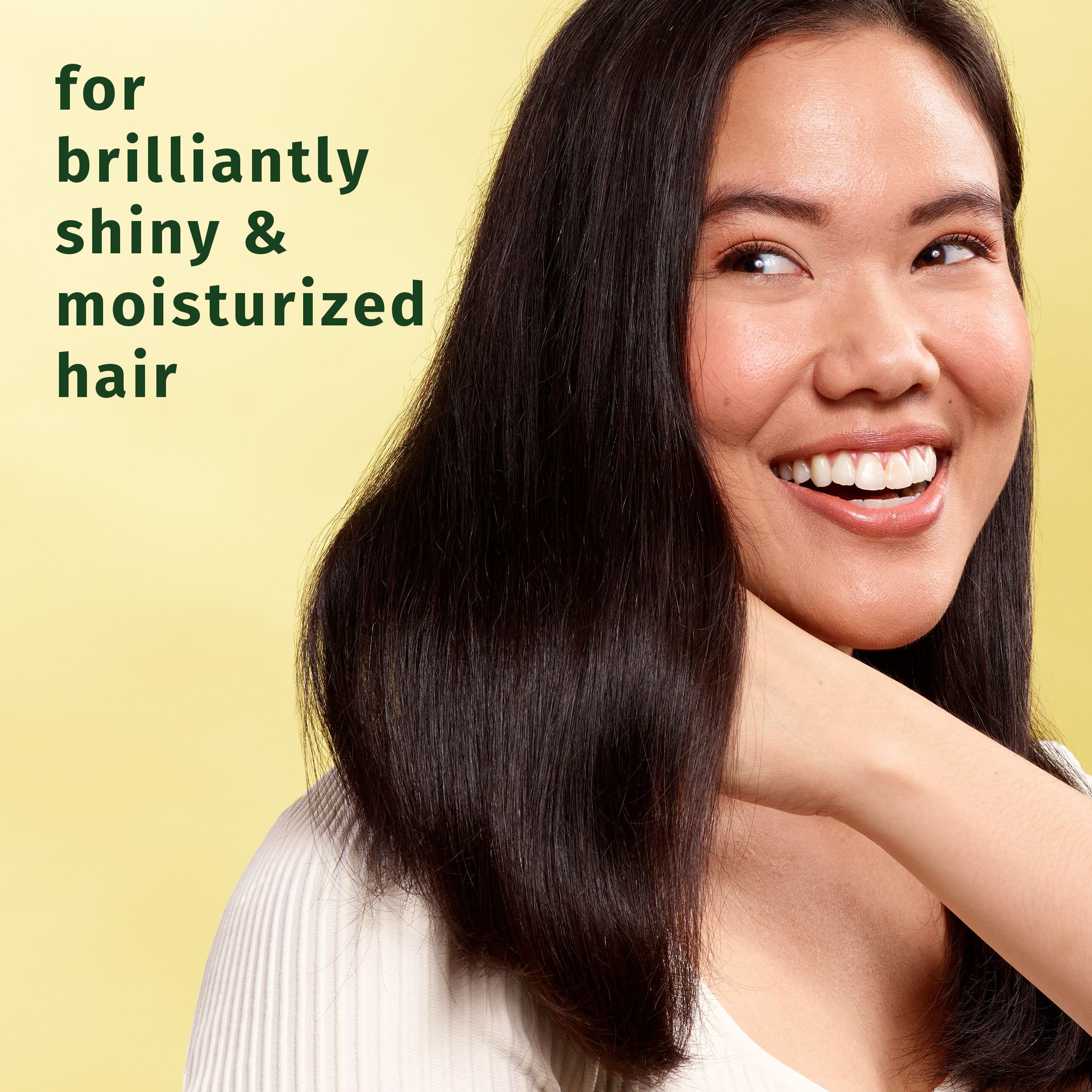 Herbal Essences conditioner cream texture close-up showing smooth spreadability