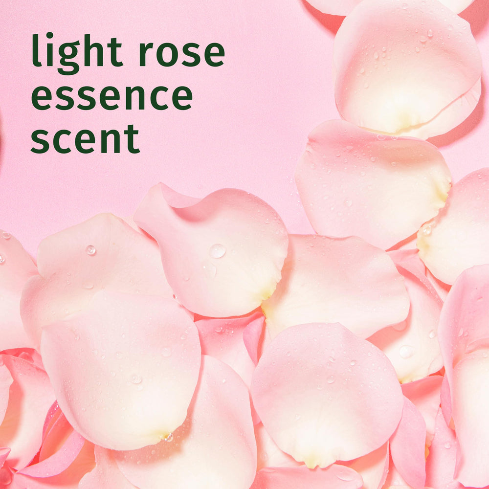 Herbal Essences close-up of rose hips extract pour, highlighting botanical nourishment