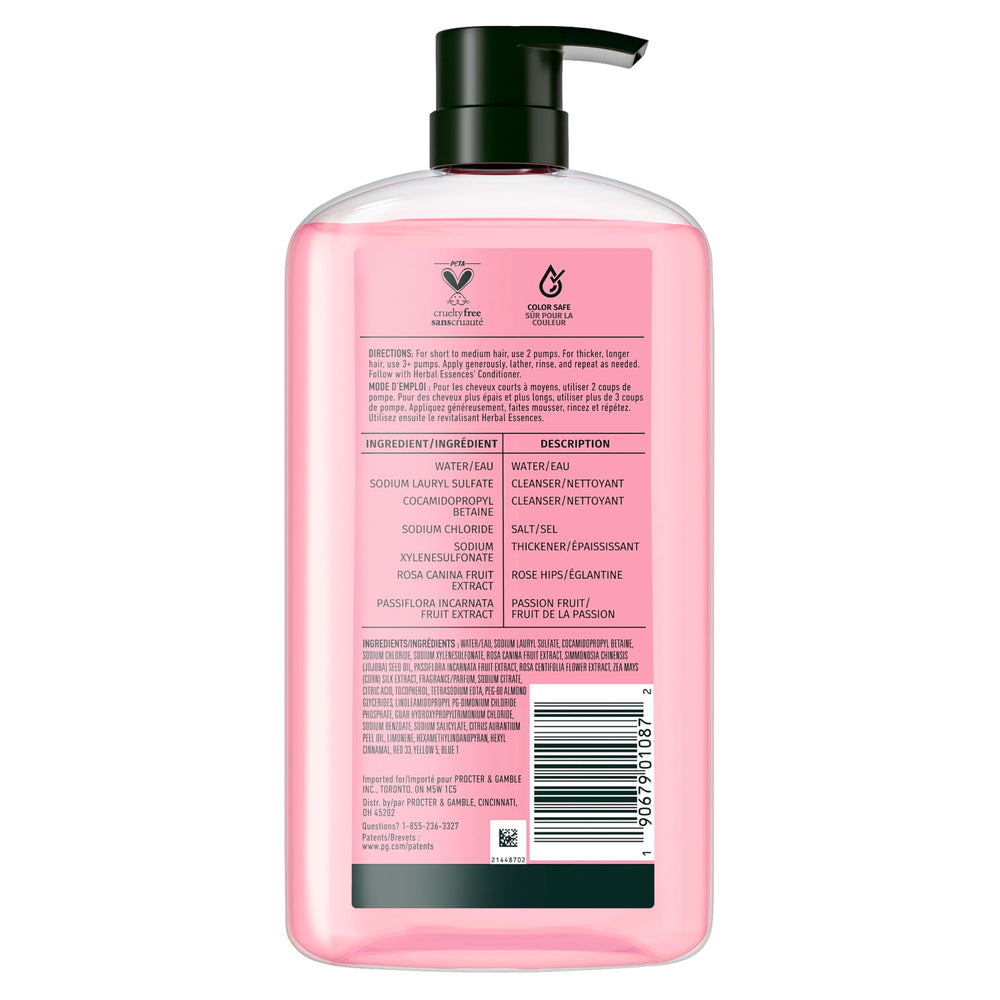 Herbal Essences bottle staged in bathroom lifestyle scene conveying fragrant, shiny results