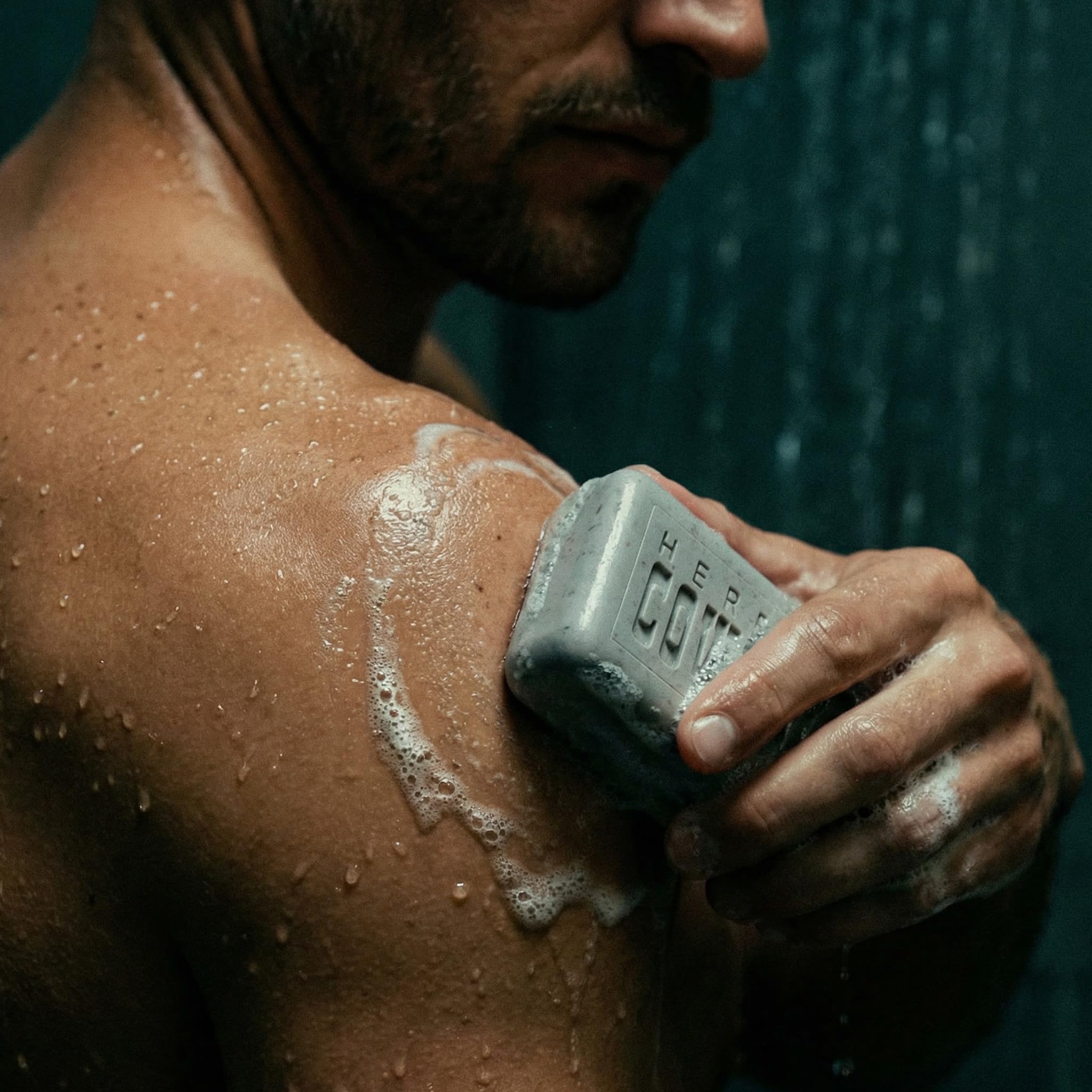 Herban Cowboy dusk on bathroom shelf styled for a refined grooming routine vibe