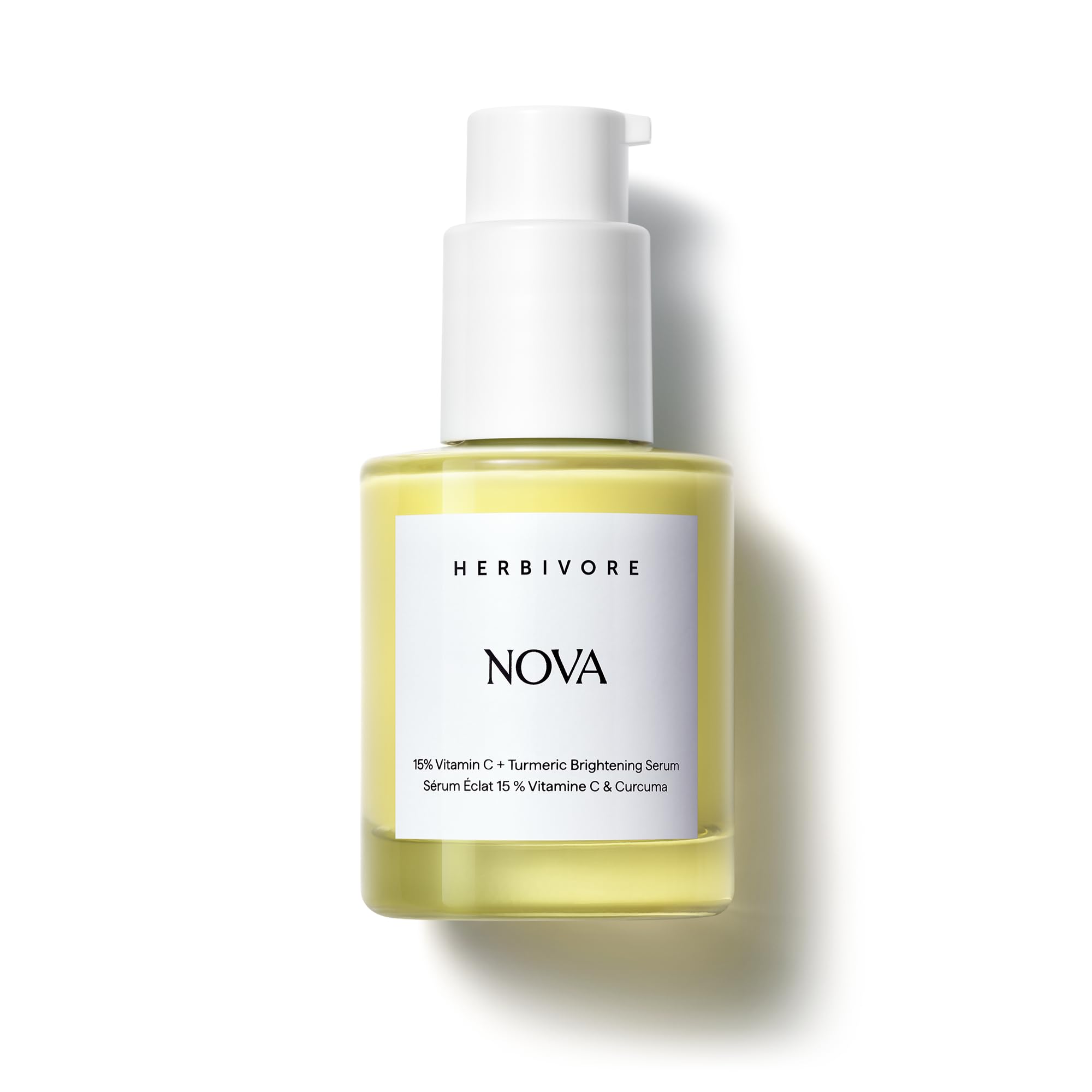 HERBIVORE Nova front bottle showing label and luminous design benefit