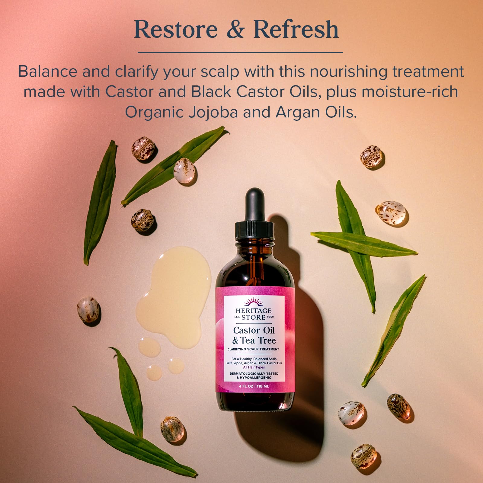 HERITAGE STORE applying oil to scalp demonstrating easy targeted use