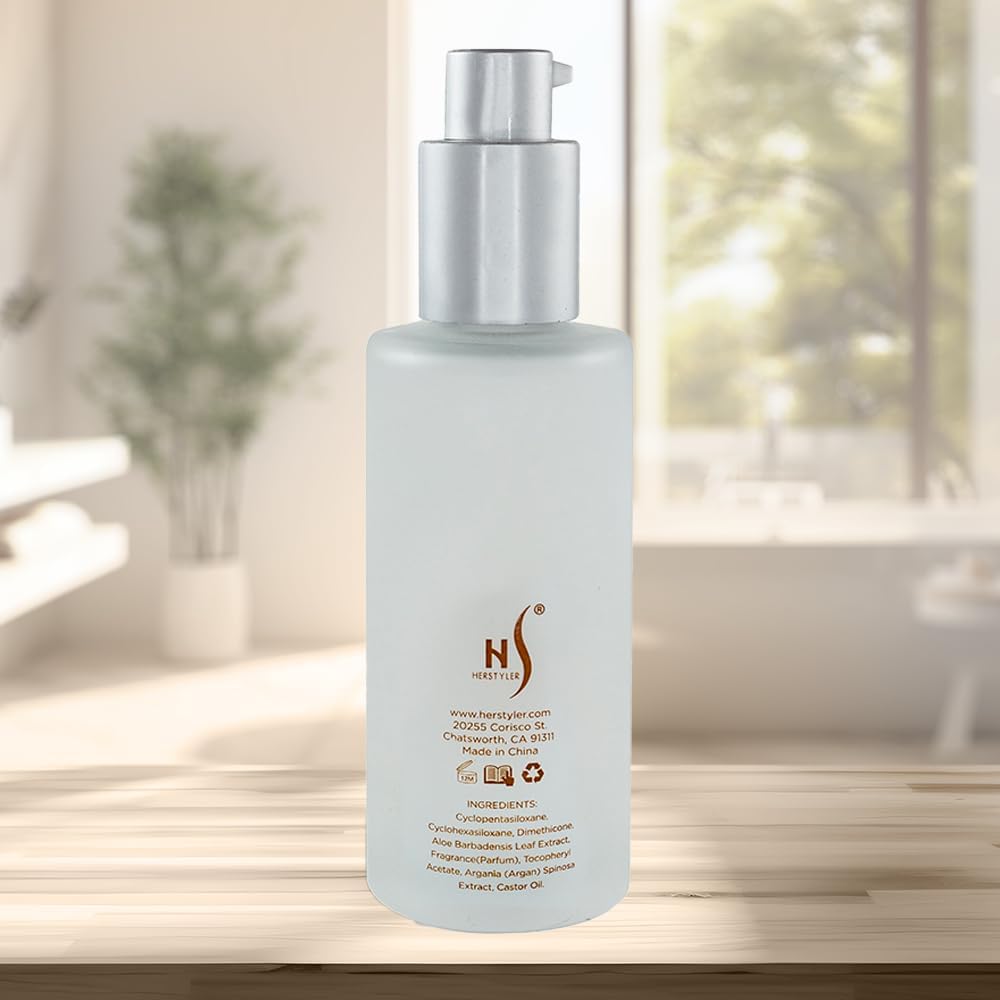 HerStyler serum placed on vanity beside styling tools for everyday use