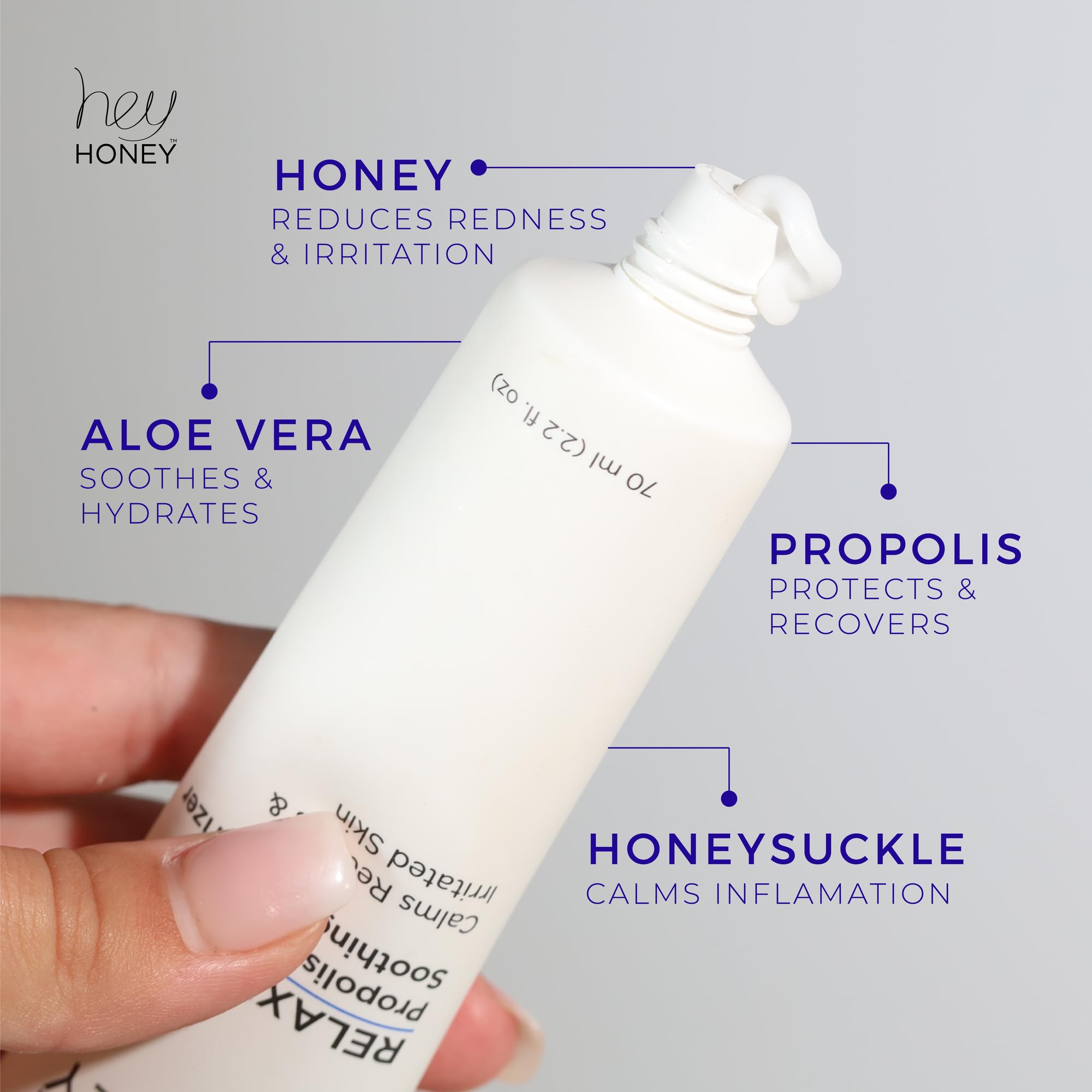 Hey Honey cream being applied to hand showing non-greasy spreadability