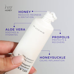 Hey Honey cream being applied to hand showing non-greasy spreadability