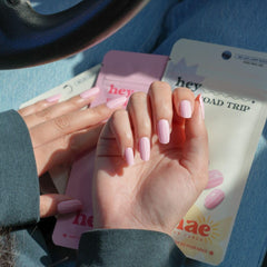 heyhae applying a strip aligned to cuticle for precise, bubble-free application