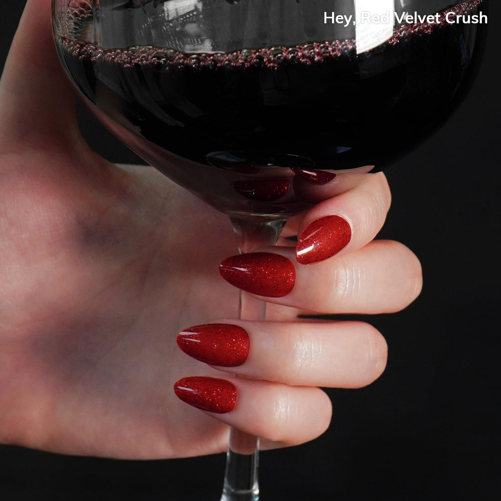 heyhae finished nails cured outdoors showcasing glossy red glitter finish
