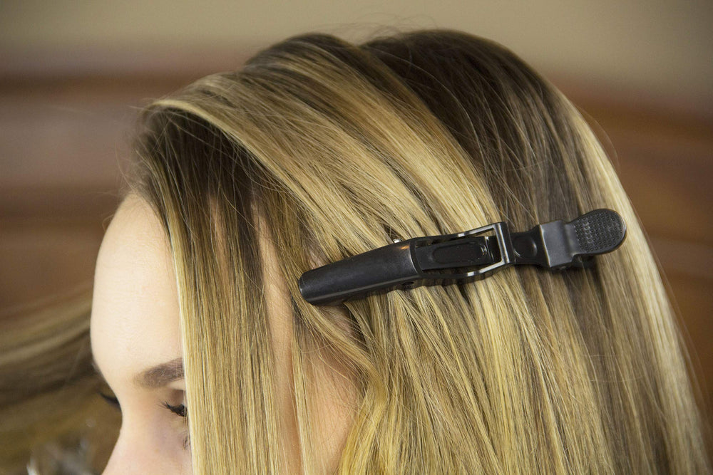 HH&LL clips holding hair during styling, steadier curl and braid setup