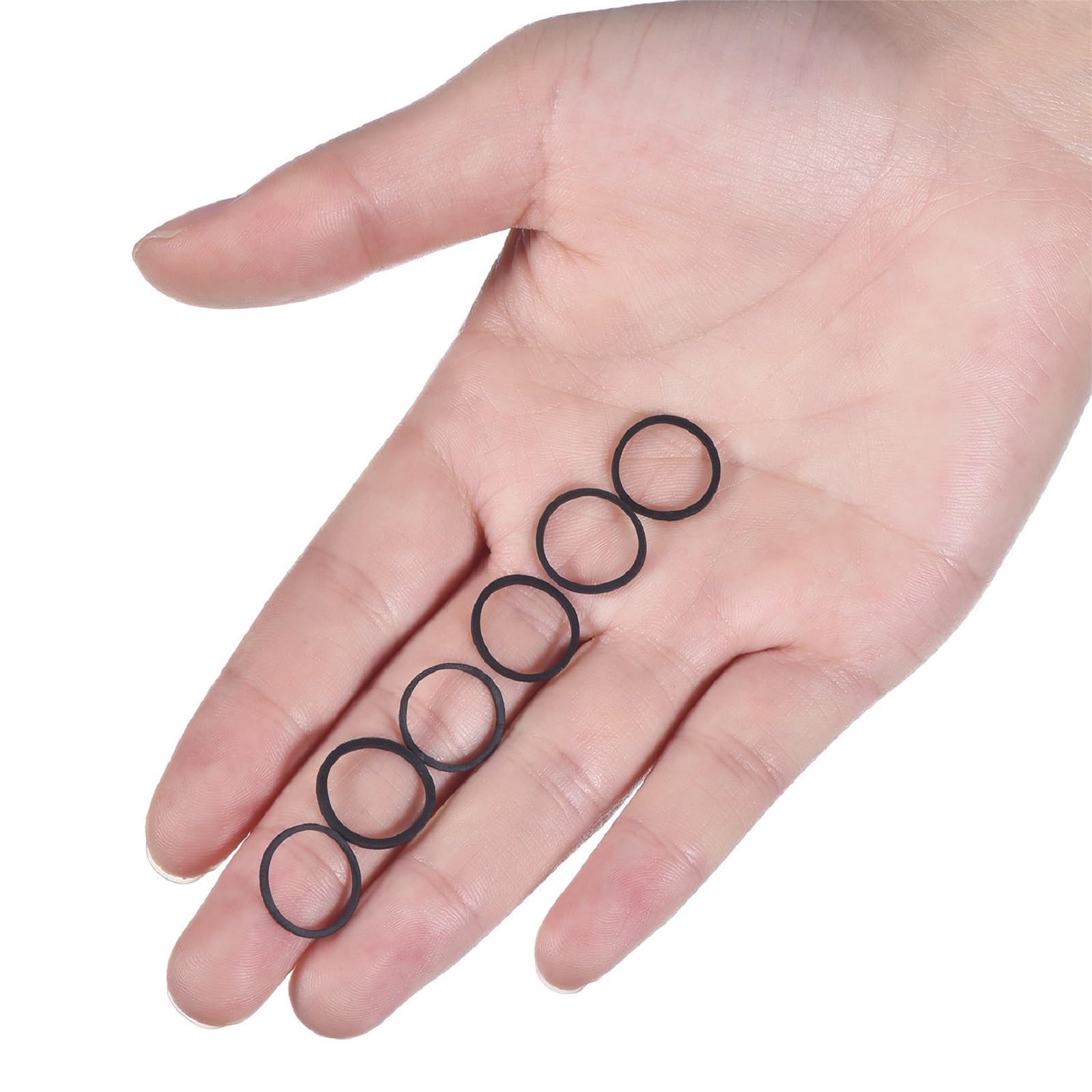 Hicarer bands held in palm to show scale and portability for on-the-go styling benefit