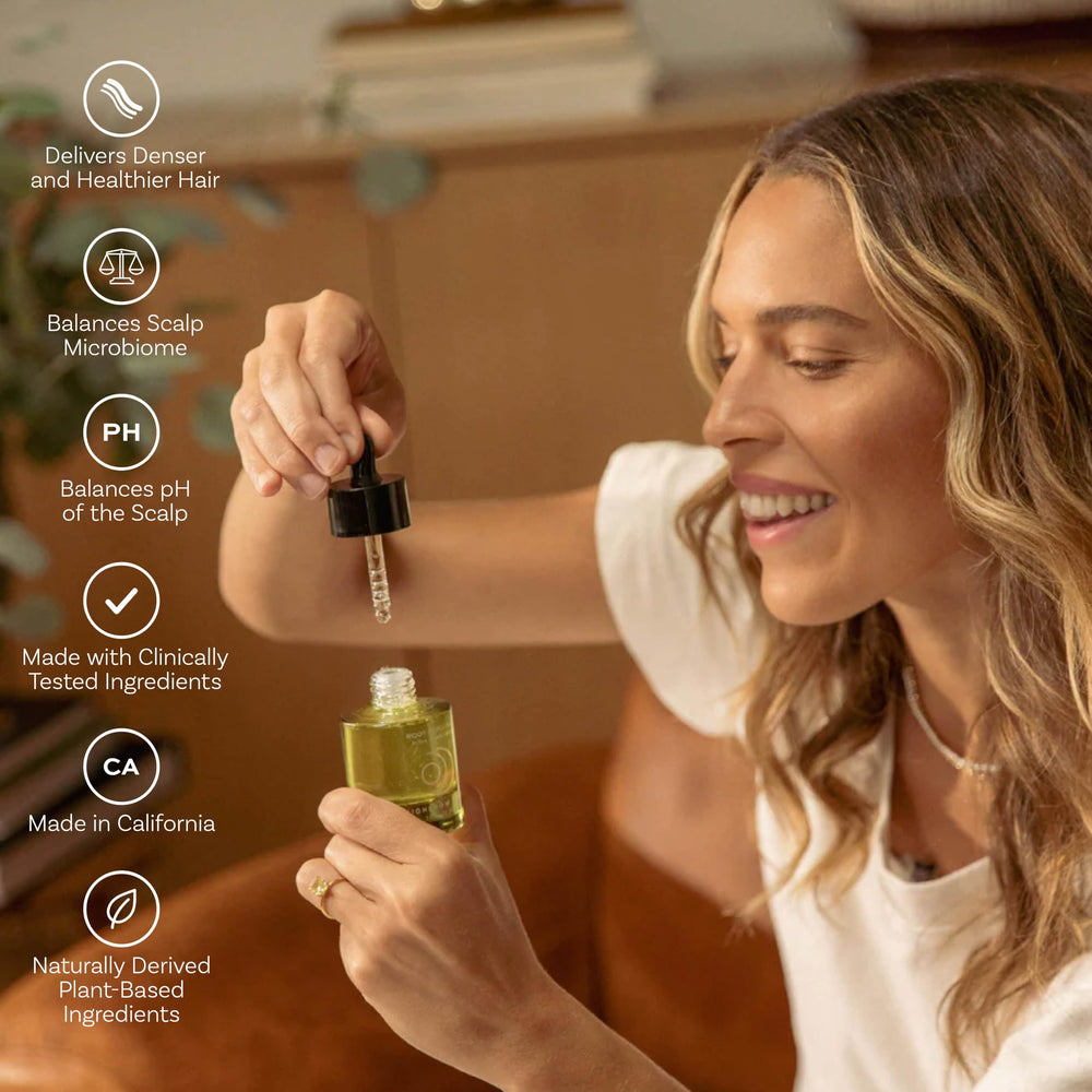 Highbrow Hippie applying serum to scalp demonstrating targeted treatment benefit