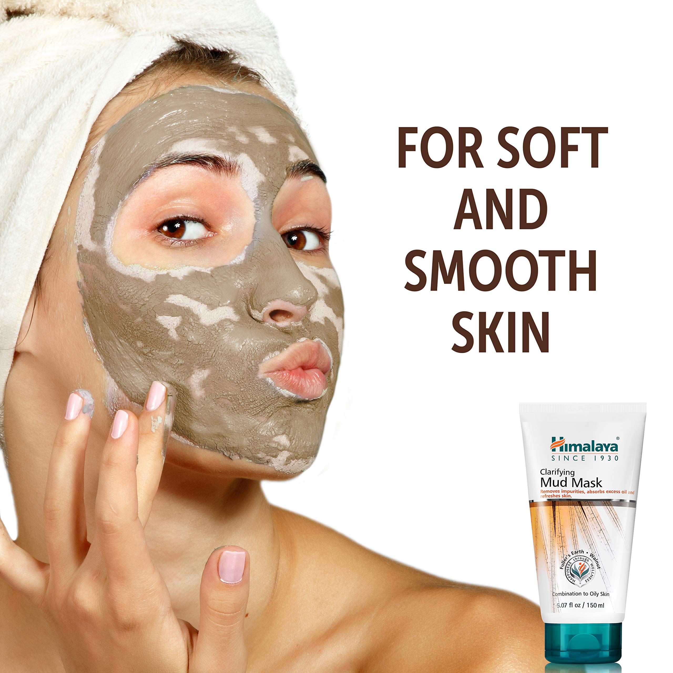 Himalaya mud mask on fingers demonstrating spreadability and even coverage