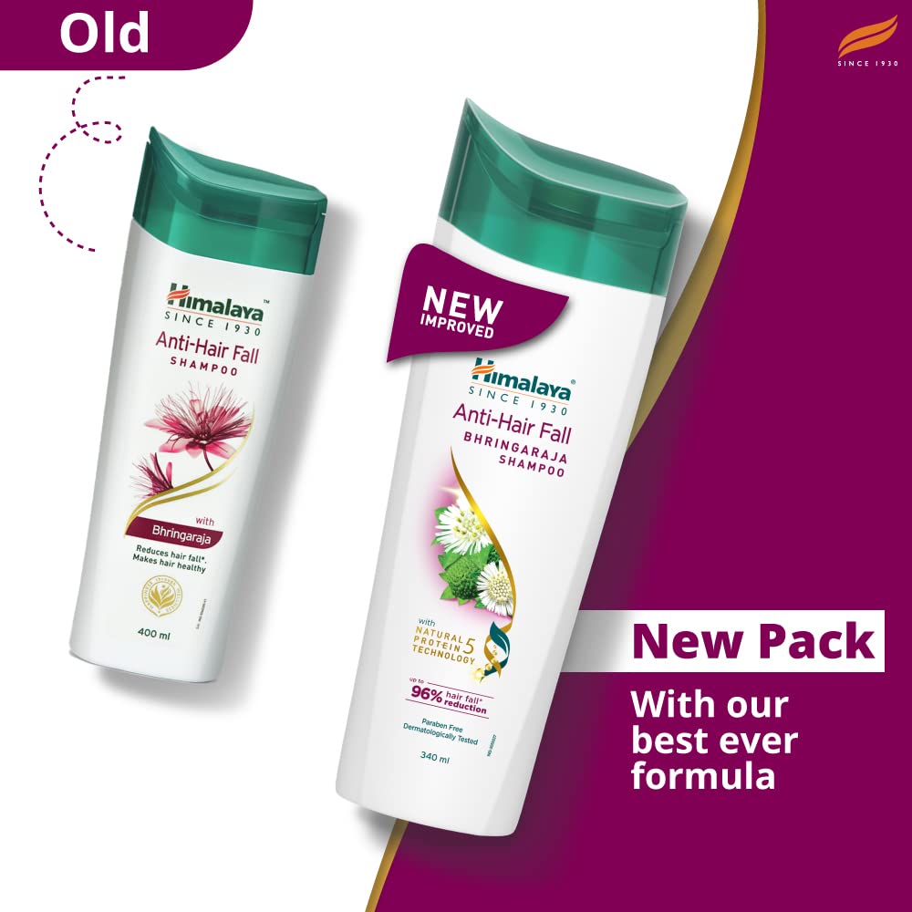 Himalaya shampoo bottle beside chickpea and herbs showcasing botanicals
