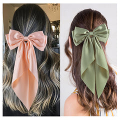 hisial bow worn on a ponytail demonstrating polished everyday style