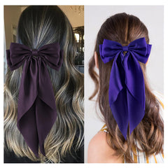 hisial bow attached to a bag showing decorative versatility and charm