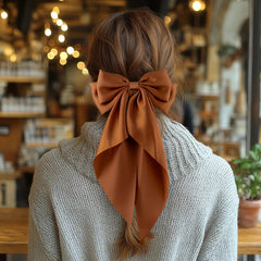 hisial arranged bows in black khaki brown white displaying color-matching versatility