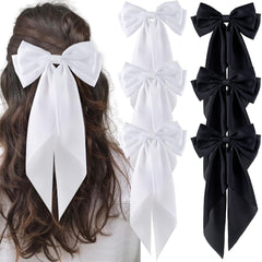 hisial front view of six black and white large bows showing elegant styling