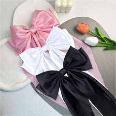 hisial lifestyle display of bows on table showing gift-ready presentation and versatility